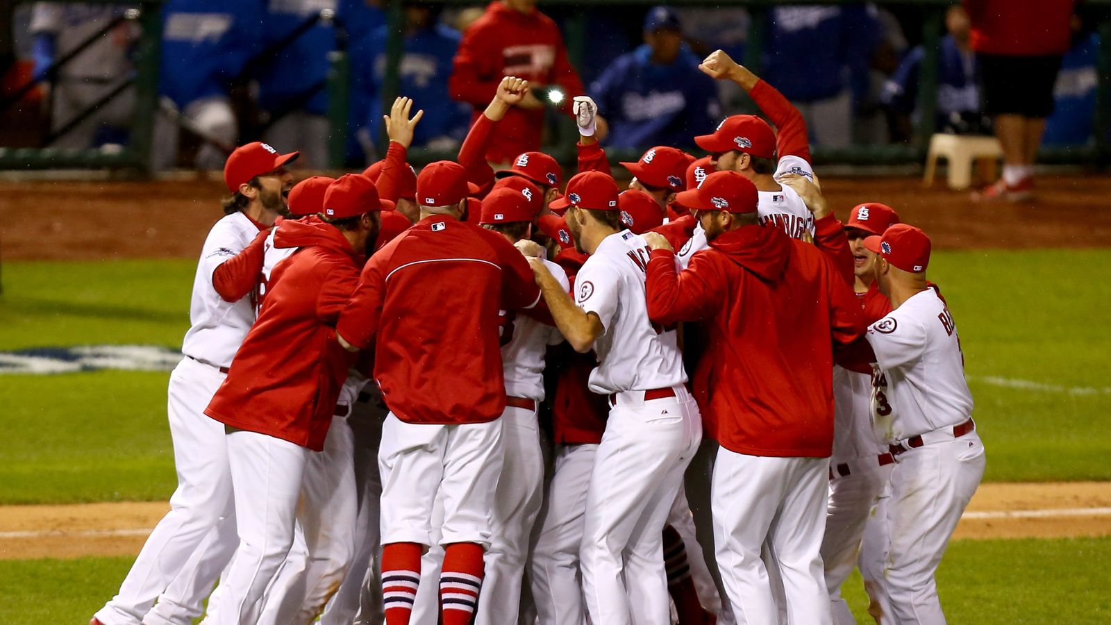 St. Louis Cardinals' Carlos Beltran celebrates at home after