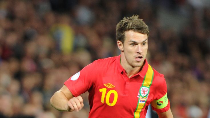 CARDIFF, WALES - SEPTEMBER 10: Wales captain Aaron Ramsey in action during the FIFA 2014 World Cup Qualifier Group A match between Wales and Serbia at Cardiff City Stadium on September 10, 2013 in Cardiff, Wales. (Photo by Matthew Horwood/Getty Images)