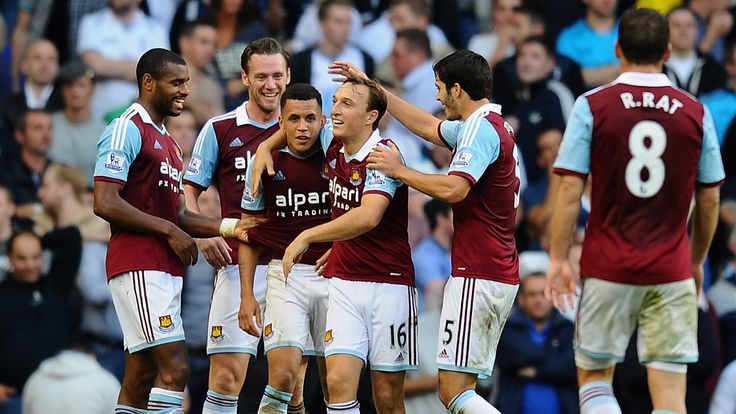 LONDON, ENGLAND - OCTOBER 06: Ravel Morrison of West Ham (3L) is congratulated by team mates after scoring his side's third goal during the Barclays Premier League match between Tottenham Hotspur and West Ham United at White Hart Lane on October 6, 2013 in London, England.  (Photo by Mike Hewitt/Getty Images)