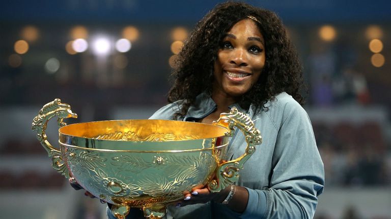 - Williams of the United States poses with her trophy during the medal ceremony after winning against Jelena Jankovic of Serbia