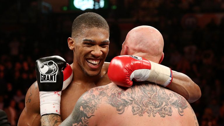 Anthony Joshua celebrates his victory over Paul Butlin during their Heavyweight bout at Motorpoint Arena in Sheffield