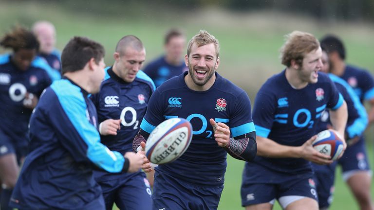  Chris Robshaw runs with the ball during the England training session held at West Park Leeds Rugby Club on October 23, 2013 in Leeds, England