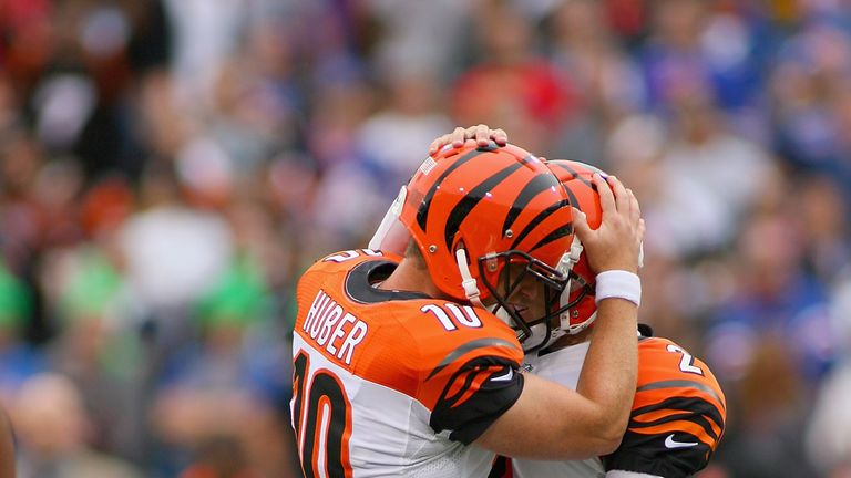 Kevin Huber and Mike Nugent of the Cincinnati Bengalsncelebrate the game-winning field goal in overtime against the Buffalo Bills at Ralph Wilson Stadium