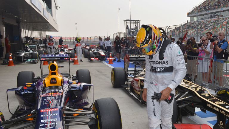 Lewis Hamilton checks out Sebastian Vettel's RB9