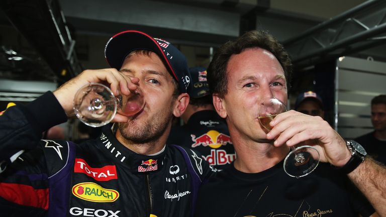 Sebastian Vettel and Christian Horner share a drink