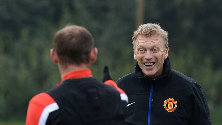 Manchester United manager David Moyes with Wayne Rooney (left) during a training session at the AON Training Complex, Manchester.