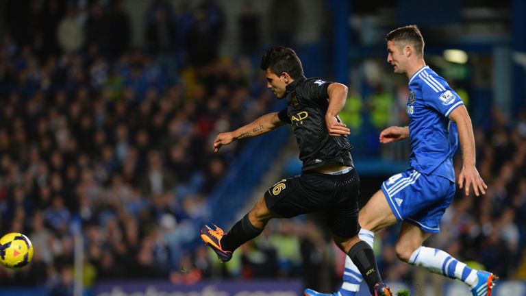 Gary Cahill of Chelsea looks on as Sergio Aguero of Manchester City scores their first goal during the Barclays Premier League match between Chelsea and Manchester City at Stamford Bridge on October 27, 2013