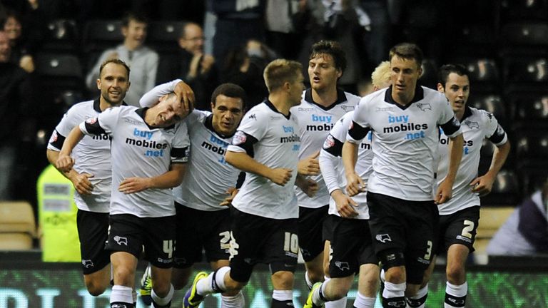 Derby County's Craig Bryson (second left) celebrates scoring his sides fourth goal of the game during the Sky Bet Championship match at Pride Park, Derby.