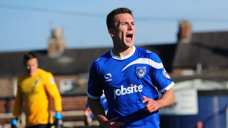 Portsmouth's Jed Wallace celebrates after scoring a goal during the Sky Bet League Two match at Bootham Crescent, York.