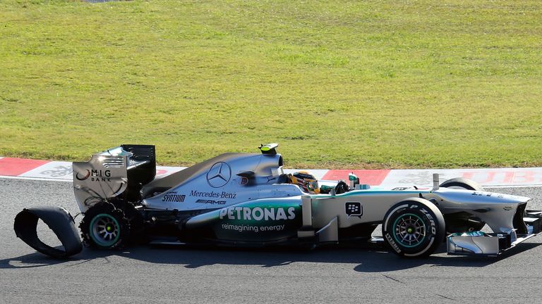 Lewis Hamilton suffered a first lap puncture