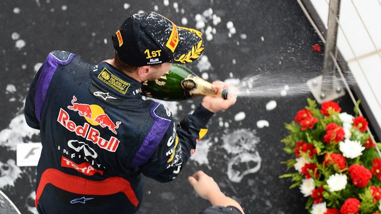 Sebastian Vettel sprays the champagne