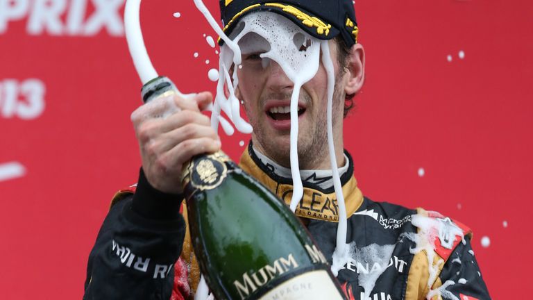 Romain Grosjean celebrates third