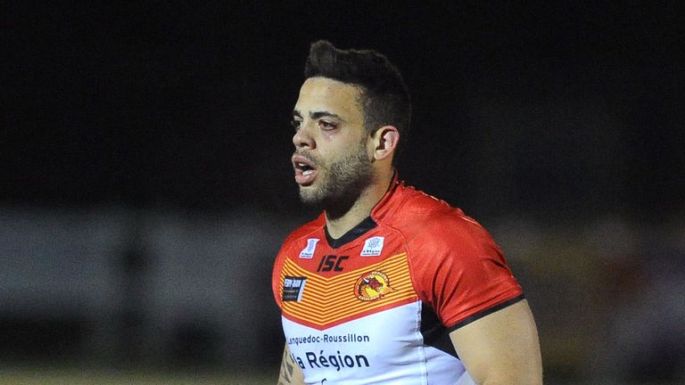 HERSHAM, ENGLAND - MARCH 28: Kevin Larroyer of Catalan Dragons attacks during the Super League match between London Broncos and Catalan Dragons at Molesey Road on March 28, 2013 in Hersham, England. (Photo by Charlie Crowhurst/Getty Images)