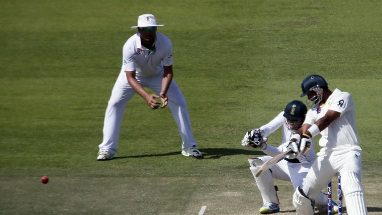 Pakistan's opener Khurram Manzoor (R) bats during the second day of their first Test against South Africa at the Sheikh Zayed Cricket Stadium in Abu Dhabi on October 15, 2013. Pakistani cricketers scored confident half-centuries to lead a strong Pakistan reply against South Africa in the first Test in in the Gulf emirate