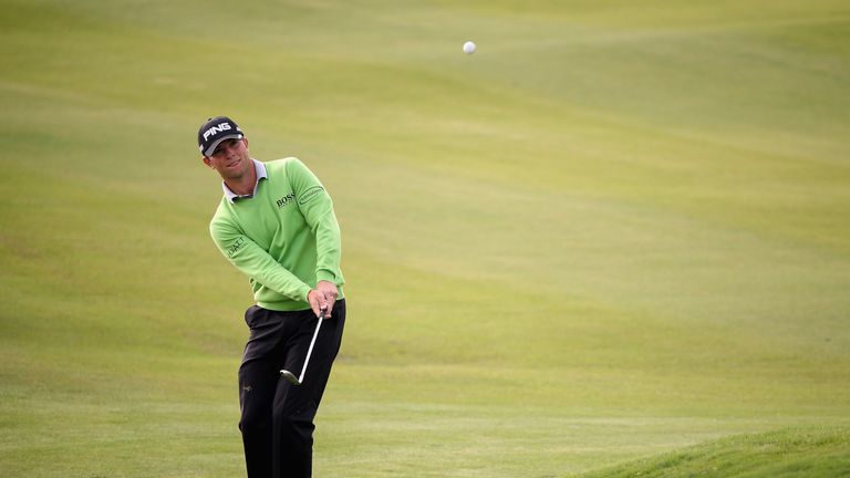 Luke Guthrie plays his third shot on the ninth hole during the third round of the BMW Masters