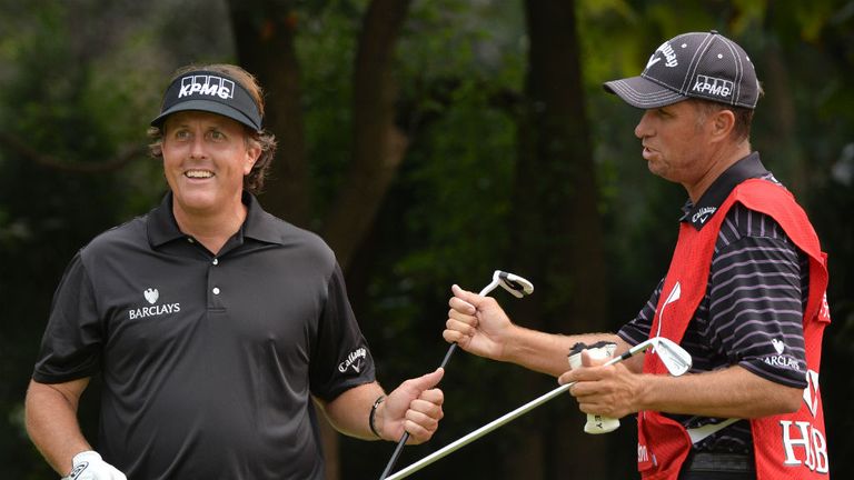 Phil Mickelson with caddie Jim 'Bones' Mackay during the pro-am for the WGC-HSBC Champions