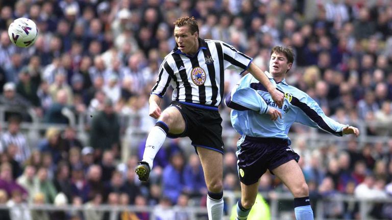 Michael Bridges of Leeds clashes with Steve Howey of Newcastle during the Newcastle United v Leeds United FA Carling Premiership match at St James's Park,.