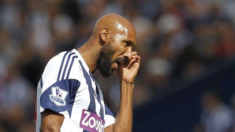 West Bromwich Albion's French striker Nicolas Anelka gestures during the English Premier League football match between West Bromwich Albion and Swansea City at The Hawthorns in West Bromwich, central England, on September 1, 2013. Swansea won the game 2-0. AFP PHOTO / IAN KINGTONnnRESTRICTED TO EDITORIAL USE. No use with unauthorized audio, video, data, fixture lists, club/league logos or live services. Online in-match use limited to 45 images, no video emulation. No use in betting, games or single club/league/player publications.        (Photo credit should read IAN KINGTON/AFP/Getty Images)