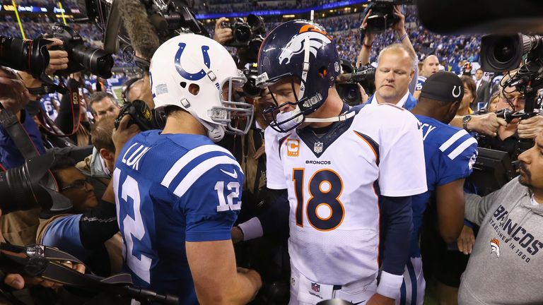 Peyton Manning congratulates Andrew Luck after the Indianapolis Colts beat the Denver Broncos at Lucas Oil Stadium