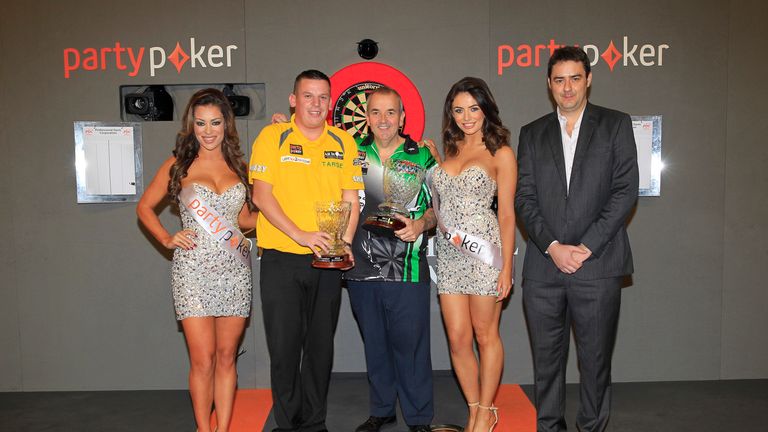 Phil Taylor and Dave Chisnall after the World Grand Prix final