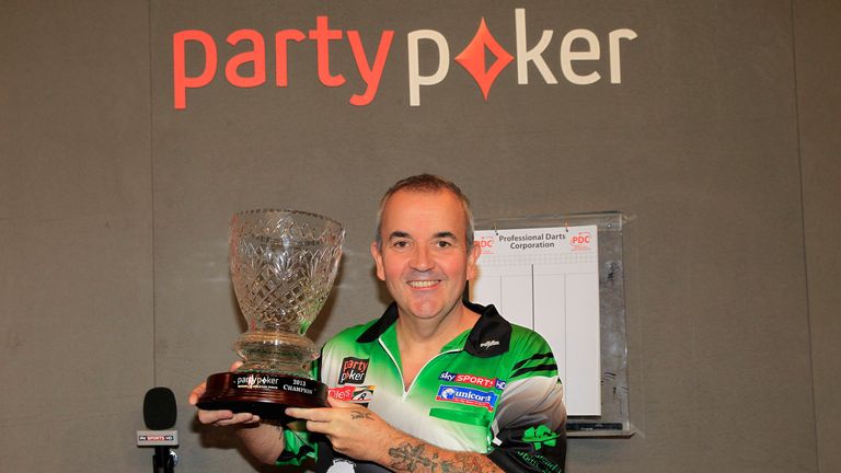 Phil Taylor with the World Grand Prix trophy