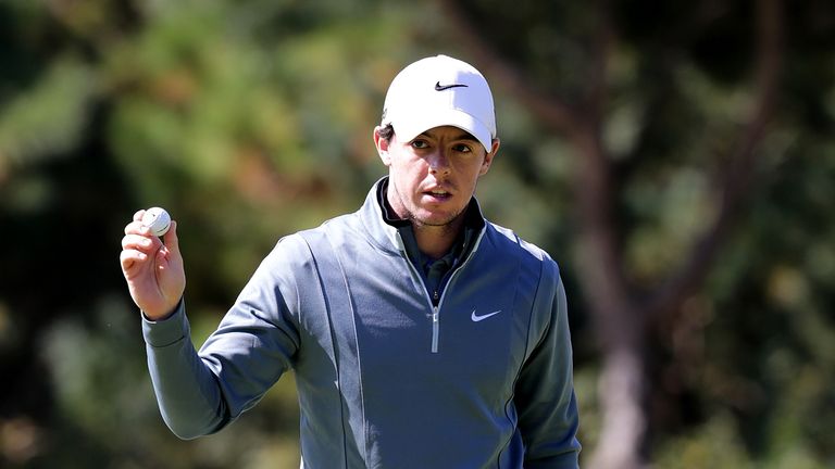 Rory McIlroy of Northern Ireland acknowledges spectators on the eighth green during the second round of the Kolon Korea Open