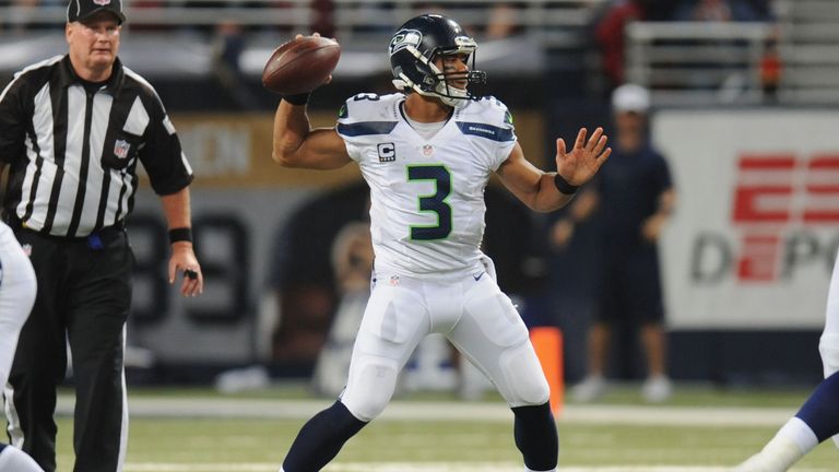 Russell Wilson #3 of the Seattle Seahawks passes in the second quarter against the St. Louis Rams at the Edward Jones Dome on October 28, 2013 in St. Louis, Missouri
