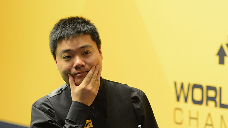 Ding Junhui of China looks on in his match against Barry Hawkins of England during the Betfair World Snooker Championship at the Crucible Theatre on April 30, 2013 in Sheffield, England