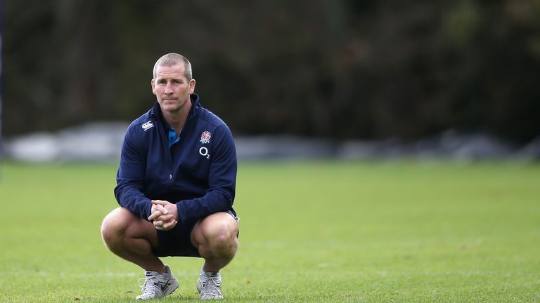Stuart Lancaster, the England head coach looks on during a training session held at Pennyhill Park in Bagshot