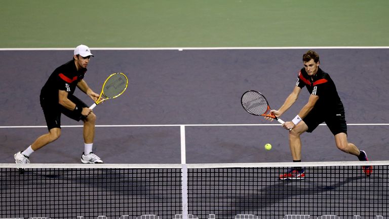 Jamie Murray returns a shot during the semifinals of the Shanghai Rolex Masters