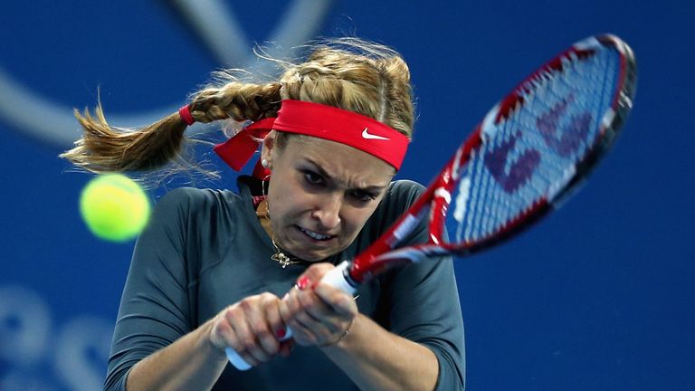  Sabine Lisicki of Germany returns a shot during her women's singles match against Li Na of China on day five of the 2013 China Open at the National Tennis Center on October 2, 2013 in Beijing, China