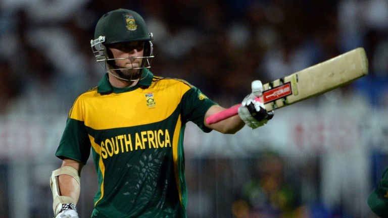South African cricketer Wayne Parnell wave his bat after making 50 during the first one-dayer against Pakistan in Sharjah