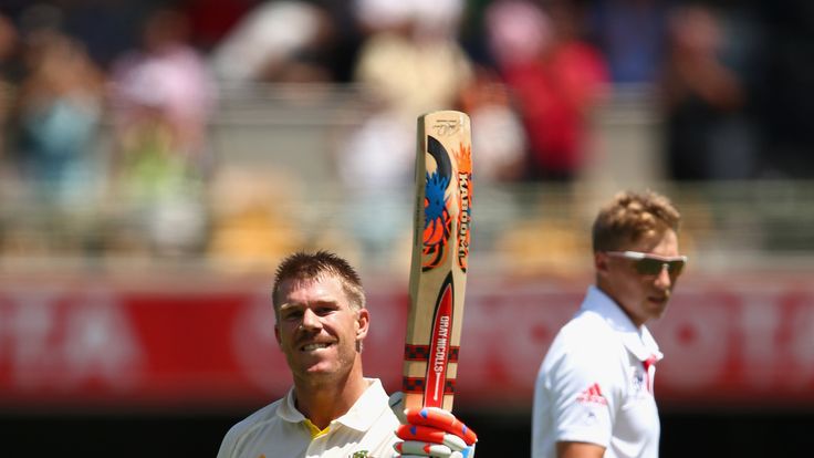 David Warner celebrates scoring a century during day three of the first Ashes Test match between Australia and England at The Gabba