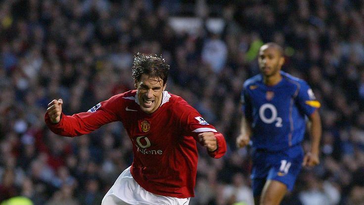 Manchester United's Ruud van Nistelrooy celebrates scoring the opening goal from the penalty spot