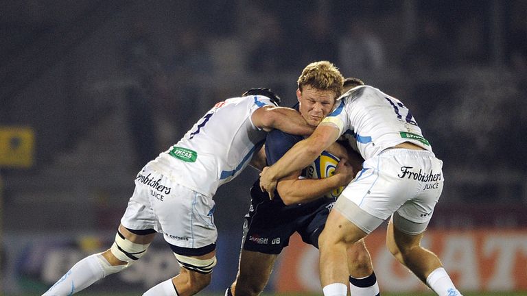 David Seymour is stopped in his tracks by Exeter duo Jason Shoemark and Sam Hill