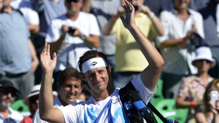 - Argentine tennis player David Nalbandian waves to supporter before an exhibition tennis match against Spanish tennis player Rafael Nadal in Buenos Aires