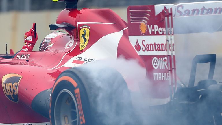 Massa lights up his tyres