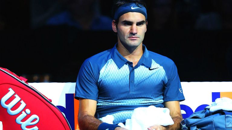 - Federer of Switzerland sits during a changeover during his mens singles semi-final match against Rafael Nadal of Spain