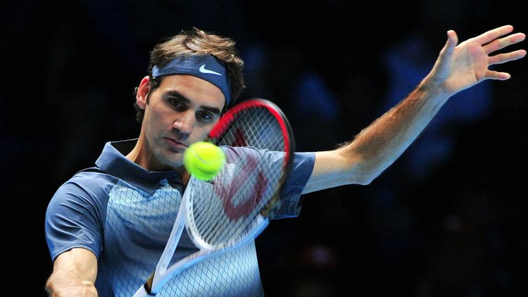 Switzerlands Roger Federer returns against Argentinas Juan Martin Del Potro during their group B singles match