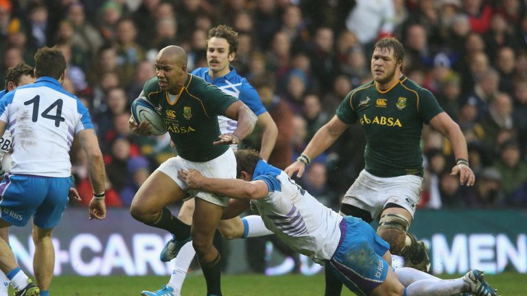 EDINBURGH, SCOTLAND - NOVEMBER 17:  JP Pietersen of South Africa is tackled by Ross Ford during the International match between Scotland and South Africa at Murrayfield Stadium on November 17, 2013 in Edinburgh, Scotland.  (Photo by David Rogers/Getty Images)
