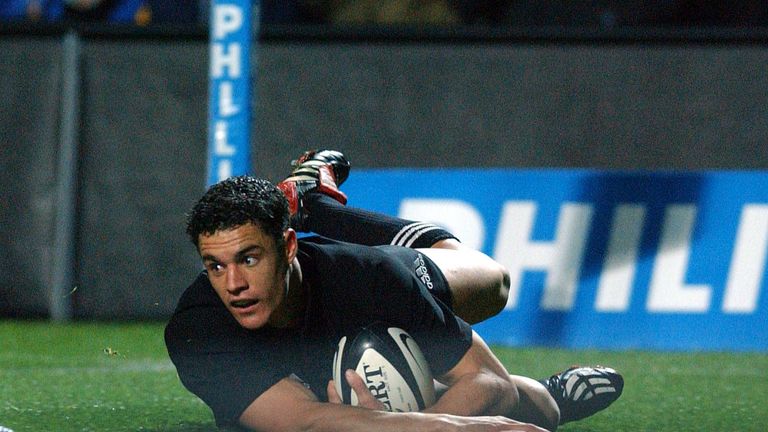 All Black Daniel Carter slides into score a try against Wales in their International Rugby Test played at the Waikato Stadium, Saturday. The All Blacks won 553. 