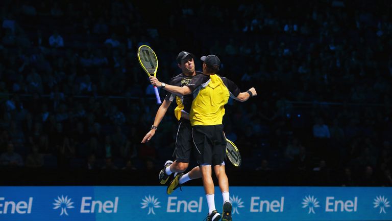 Bob and Mike (R) Bryan of the United States celebrate victory in their men's doubles match against Aisam-ul-Haq Qureshi of Pakistan and Jean-Julien Rojer of the Netherlands during day four of the Barclays ATP World Tour Finals at O2 Arena