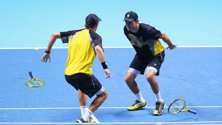 Bob and Mike Bryan of the United States celebrate victory in their men's doubles semi-final match against Alexander Peya of Austria and Bruno Soares of Brazil during day seven of the Barclays ATP World Tour Finals