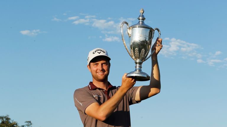 Chris Kirk poses with the trophy after winning The McGladrey Classic at Sea Island's Seaside Course