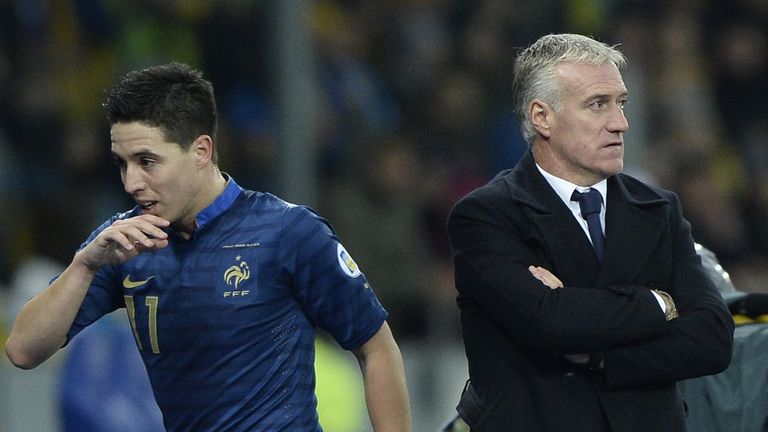 France's midfielder Samir Nasri (L) leaves the pitch next to France's head coach Didier Deschamps during the FIFA World Cup 2014 qualifying football match Ukraine vs France on November 15, 2013 at the Olympic stadium in Kiev.  AFP PHOTO / FRANCK FIFE        (Photo credit should read FRANCK FIFE/AFP/Getty Images)