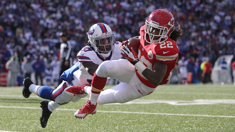 Dexter McCluster #22 of the Kansas City Chiefs is tackled after making the catch during NFL game action by Nickell Robey #37 of the Buffalo Bills at Ralph Wilson Stadium on November 3, 2013 in Orchard Park, New York