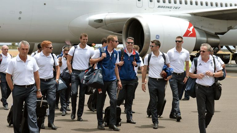 The England cricket team arrive at Alice Springs airport, Australia.