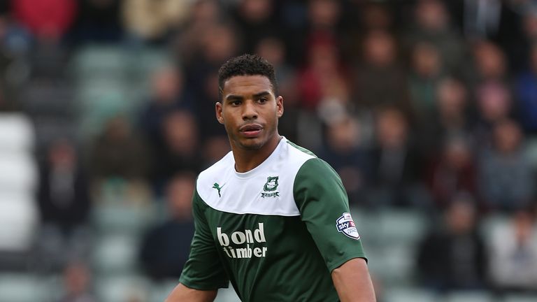 PLYMOUTH, ENGLAND - NOVEMBER 02:  Reuben Reid of Plymouth Argyle in action during the Sky Bet League Two match between Plymouth Argyle and Northampton Town at Home Park on November 2, 2013 in Plymouth, England.  (Photo by Pete Norton/Getty Images)