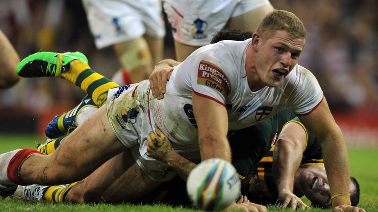 England's George Burgess scores a try during the 2013 Rugby League World Cup group A match between Australia and England at the Millennium Stadium in Cardiff, south Wales on October 26, 2013
