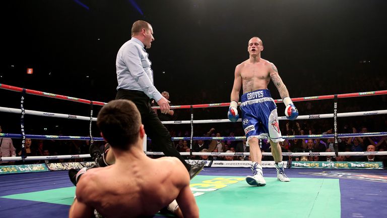 Carl Froch is floored by  George Groves during their IBF and WBA World super-middleweight bout